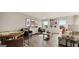 Casual loft with multiple seating areas and a hardwood floor, great for entertaining at 687 Edgar St # 83, Hampton, GA 30228