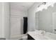 Modern bathroom with subway tiles, sleek fixtures, and a vanity at 1100 Thomas St, Woodstock, GA 30188