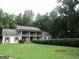 Beautiful two story home with second story veranda and lush surrounding landscape at 5523 Bahia Mar Cir, Stone Mountain, GA 30087