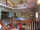 Second floor foyer featuring hardwood floors, wooden railing and decor at 5523 Bahia Mar Cir, Stone Mountain, GA 30087