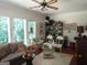 Comfortable living room with large windows at 5523 Bahia Mar Cir, Stone Mountain, GA 30087