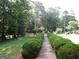 Beautiful walking path surrounded by plush landscaping leading to the home at 5523 Bahia Mar Cir, Stone Mountain, GA 30087
