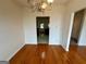 An elegant dining room featuring hardwood floors and a decorative light fixture at 6367 Ellenwood Drive, Rex, GA 30273