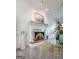 Elegant fireplace with marble surround, adding a touch of sophistication to the home's interior at 150 Tramore Trce, Tyrone, GA 30290