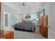 Spacious main bedroom with tray ceilings, ceiling fan and neutral paint at 150 Tramore Trce, Tyrone, GA 30290