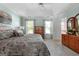 Spacious main bedroom with tray ceilings, ceiling fan and neutral paint at 150 Tramore Trce, Tyrone, GA 30290