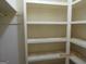 Bright, empty closet with multiple built-in shelves ready to be organized for maximum storage and convenience at 3048 Haverford Se Ln, Marietta, GA 30067