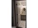 Stylish bathroom with granite countertop, round mirror, and marble tile floor at 2920 Prestwood Dr, Cumming, GA 30040