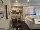Open-concept living area with view of kitchen and stylish decor at 2920 Prestwood Dr, Cumming, GA 30040