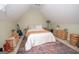 Charming bedroom with carpet, an area rug, a full size bed, and rustic furniture at 65 Cold Harbor Ct, Sharpsburg, GA 30277