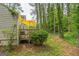 Cozy back deck with a yellow umbrella, perfect for outdoor relaxation and entertaining at 447 Sherwood Cir, Stone Mountain, GA 30087
