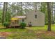 The backyard has a deck and ample green space, perfect for recreation and enjoyment at 447 Sherwood Cir, Stone Mountain, GA 30087