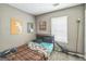 Bedroom with carpet, bright window and decorative posters at 447 Sherwood Cir, Stone Mountain, GA 30087