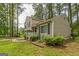 Charming home with a well-maintained front yard, mature trees, and inviting curb appeal at 447 Sherwood Cir, Stone Mountain, GA 30087