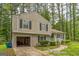 Two story home with well maintained lawn and open garage at 447 Sherwood Cir, Stone Mountain, GA 30087