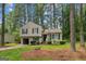 Charming home with a well-maintained front yard, mature trees, and inviting curb appeal at 447 Sherwood Cir, Stone Mountain, GA 30087