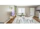 Cozy living room featuring hardwood floors, soft decor, and natural light at 447 Sherwood Cir, Stone Mountain, GA 30087