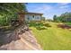 Charming home with a mix of brick and siding, complemented by a stairway, offering a welcoming curb appeal at 6674 Cowan Mill Rd, Winston, GA 30187