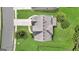 Aerial view of home with well-maintained landscaping, long driveway, and gray roof with visible vents at 2619 Dayview, Atlanta, GA 30331