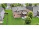 Aerial view of a backyard with a deck, well-maintained lawn and mature trees at 2619 Dayview, Atlanta, GA 30331