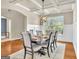 Dining room with coffered ceiling, hardwood floors, and wainscoting detail at 2619 Dayview, Atlanta, GA 30331