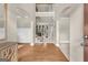 Spacious foyer with hardwood floors, arched doorways, and staircase with iron railing at 2619 Dayview, Atlanta, GA 30331