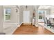 Bright foyer with hardwood floors, white door, and views into dining room at 2619 Dayview, Atlanta, GA 30331