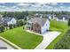 Beautiful aerial view of home on large manicured lot with long driveway and mature trees in established neighborhood at 366 Whitney Ln, Mcdonough, GA 30253