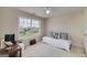 Bright bedroom with a ceiling fan and a large window with nice views at 366 Whitney Ln, Mcdonough, GA 30253