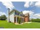 Charming home with a brick and vinyl exterior, green shutters, covered front porch, and well-manicured lawn at 366 Whitney Ln, Mcdonough, GA 30253