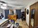 This bedroom features hardwood floors, a closet, and windows for natural light at 1791 Little Fawn Nw Trl, Conyers, GA 30012