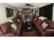Cozy living room features a stone fireplace, plush seating, and warm, inviting decor at 1791 Little Fawn Nw Trl, Conyers, GA 30012