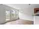 Bright eat-in kitchen with lots of natural light and laminate flooring at 308 Sarasota Ln, Locust Grove, GA 30248