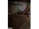 The unfinished basement has bare concrete walls, exposed pipes, and a staircase at 6337 Wellington Way, Austell, GA 30106