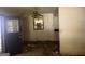 The living room features a window air conditioner, ceiling fan, and unkempt floors at 6337 Wellington Way, Austell, GA 30106