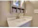 Clean bathroom featuring a sleek vanity with modern fixtures, enhancing its appeal and utility at 11 Grove Ln, Hampton, GA 30228