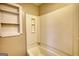 A bright bathroom includes a tub-shower combination, complemented by neutral tones and a functional layout at 11 Grove Ln, Hampton, GA 30228