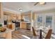 Updated kitchen features stainless steel appliances and a cozy breakfast nook at 11 Grove Ln, Hampton, GA 30228