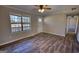 Spacious living area features ample natural light and modern flooring at 11 Grove Ln, Hampton, GA 30228
