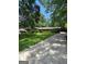 Lovely one-story home boasts a lush green lawn and long concrete driveway at 2527 Amalfi Dr, Conyers, GA 30012