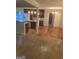 Open-concept living space featuring modern kitchen, hardwood floors and a casual atmosphere at 2527 Amalfi Dr, Conyers, GA 30012