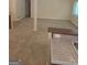 Bright, open-concept living area with a carpeted floor and granite counter top at 2527 Amalfi Dr, Conyers, GA 30012