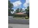 Scenic view of pavilion and lake under a partly cloudy, bright blue sky at 2527 Amalfi Dr, Conyers, GA 30012