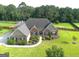 Beautifully landscaped yard with a fenced in backyard at 116 Standford Dr, Mcdonough, GA 30252