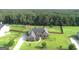 A home with a beautifully landscaped yard and a fenced in backyard at 116 Standford Dr, Mcdonough, GA 30252
