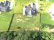 Large property features manicured lawn, fenced yard, and wooded backdrop for privacy at 116 Standford Dr, Mcdonough, GA 30252