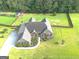Beautifully landscaped yard with a fenced in backyard at 116 Standford Dr, Mcdonough, GA 30252