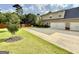 Spacious backyard featuring a well-maintained lawn, patio area, and plenty of room for outdoor activities at 116 Standford Dr, Mcdonough, GA 30252
