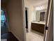 Bathroom view with granite vanity, tiled floors, and separate shower behind a dark curtain at 116 Standford Dr, Mcdonough, GA 30252
