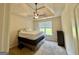 Bedroom featuring carpet, ceiling fan, and large window at 116 Standford Dr, Mcdonough, GA 30252